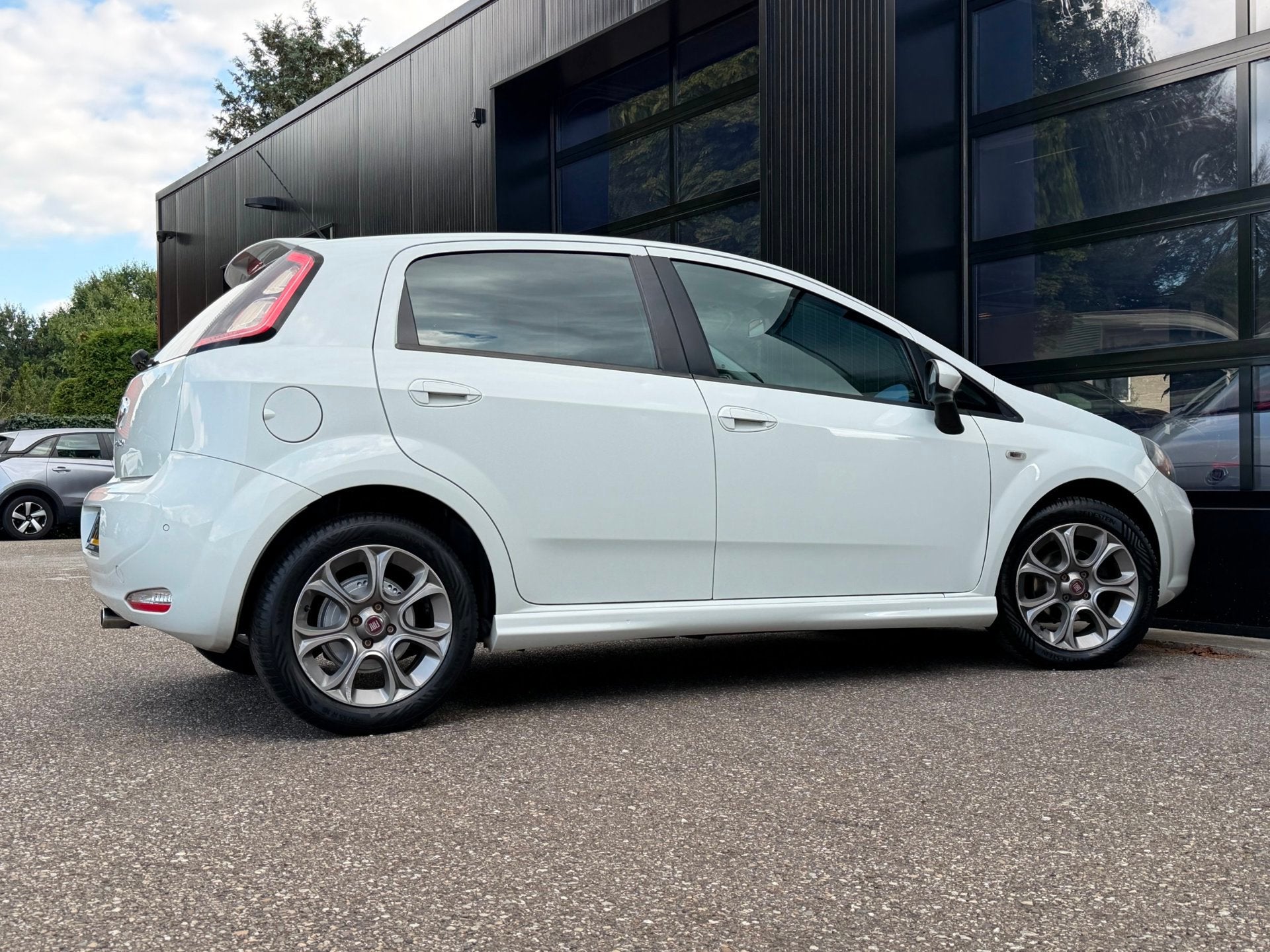 Fiat Punto Evo 0.9 TwinAir Lounge Clima Cruise PDC Blueth., Auto's, Voorwielaandrijving, 101 pk, Gebruikt, Alcantara