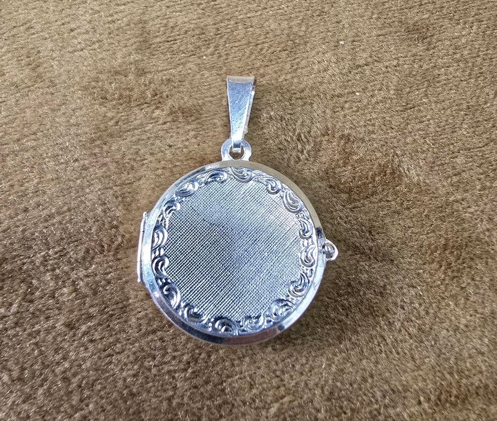 Oud zilveren medaillon voor twee foto's, Sieraden, Tassen en Uiterlijk, Kettinghangers, Ophalen of Verzenden, Zo goed als nieuw