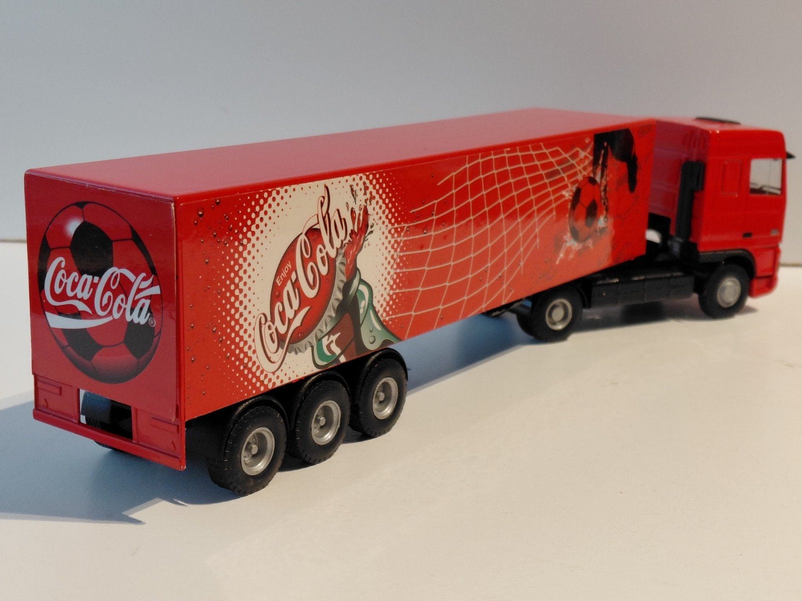 Lion Car DAF 95XF oplegger CocaCola vrachtauto modelauto, Ophalen of Verzenden, Zo goed als nieuw, Bus of Vrachtwagen, Lion Toys