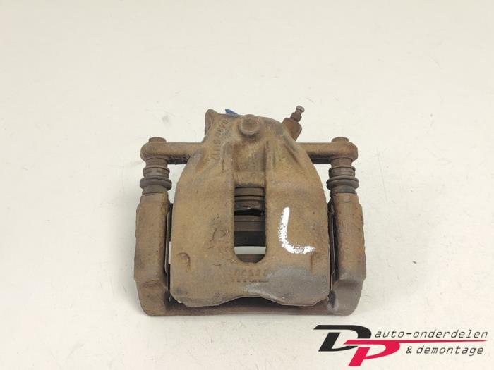 Remklauw (Tang) links-voor van een Nissan Note