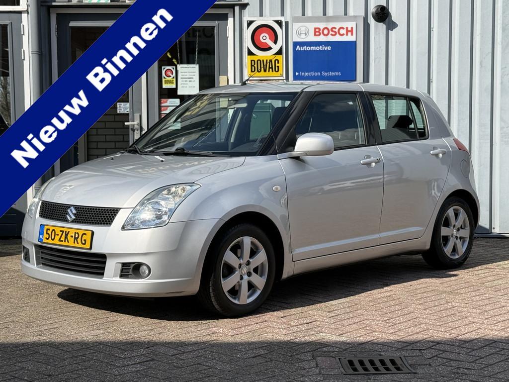 Suzuki Swift 1.5 Exclusive. | BLUETOOTH | AIRCO | NW APK | A, Voorwielaandrijving, Zwart, 4 cilinders, 400 kg