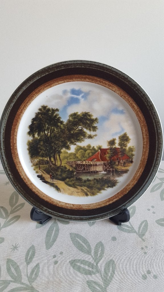 Gesigneerd porseleinen Sierbord van J.C. van Hunnik, Ophalen