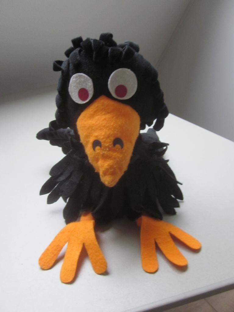 Interimage Fabeltjeskrant zwart pluche kraai handpop poppenk, Ophalen of Verzenden, Gebruikt, Eend