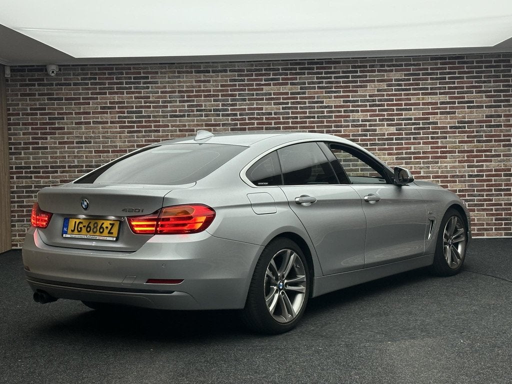 BMW 4-serie Gran Coupé 420i Centennial Executive Sport Line, Auto's, BMW, Automaat, 1998 cc, Achterwielaandrijving, Gebruikt