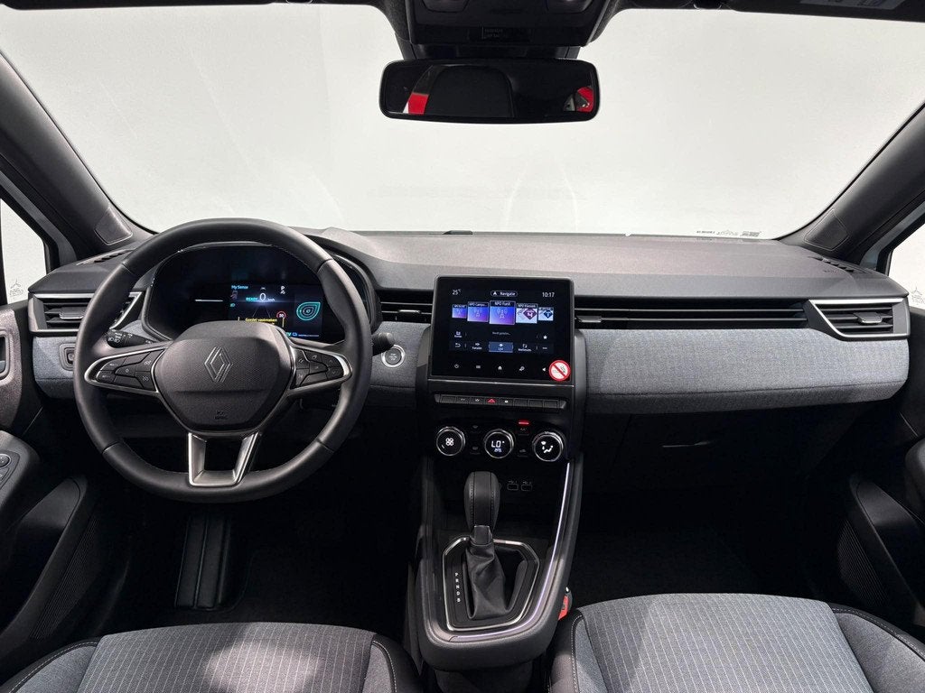 Renault Clio 1.6 E-Tech Full Hybrid 145 techno | Navigatie |, Auto's, Gebruikt, Met garantie (alle), Leder en Stof, Wit
