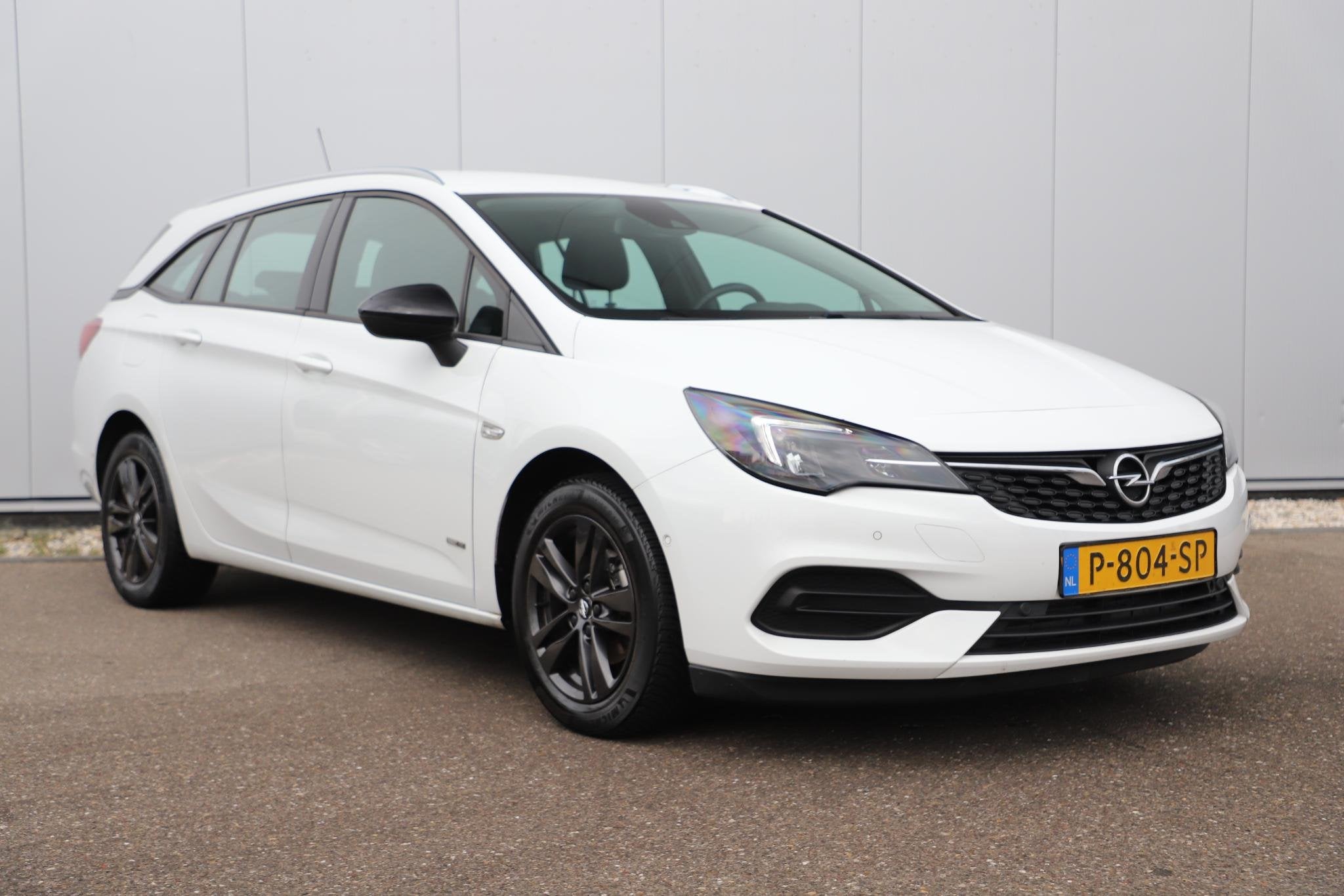 Opel Astra Sports Tourer 1.2 Design & Tech 110PK Navigatie A, Voorwielaandrijving, Stof, Gebruikt, Euro 6