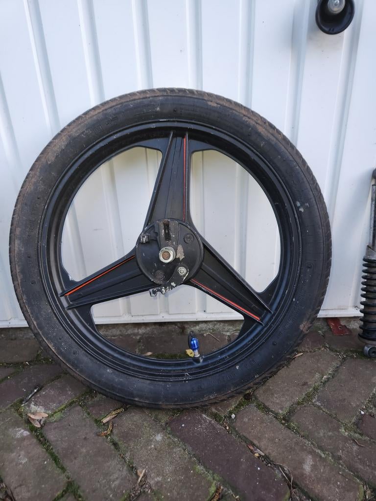 Puch onderdelen: Biturbo uitlaat, schokbrekers, 16 inch velg, Fietsen en Brommers, Ophalen of Verzenden, Zo goed als nieuw, Uitlaat