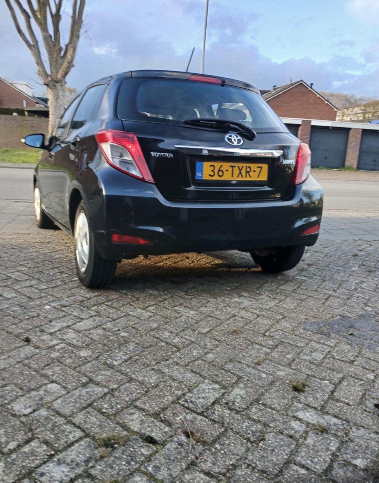 Toyota Yaris 1.0 12V Vvt-i 5DR 2012 Zwart, Stof, Zwart, Parkeersensor, Zwart
