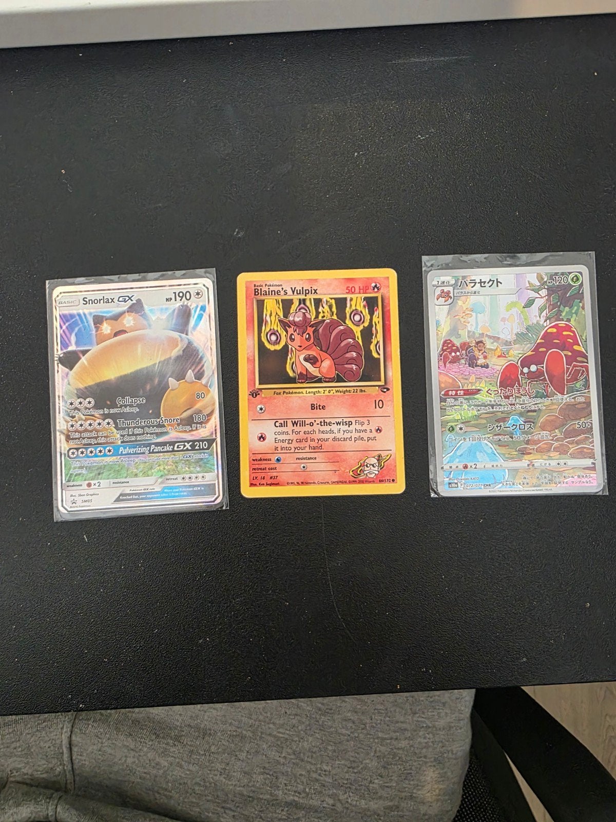 Pokémon kaarten - Snorlax GX, Blaine's Vulpix, Parasect, Ophalen of Verzenden, Zo goed als nieuw, Meerdere kaarten