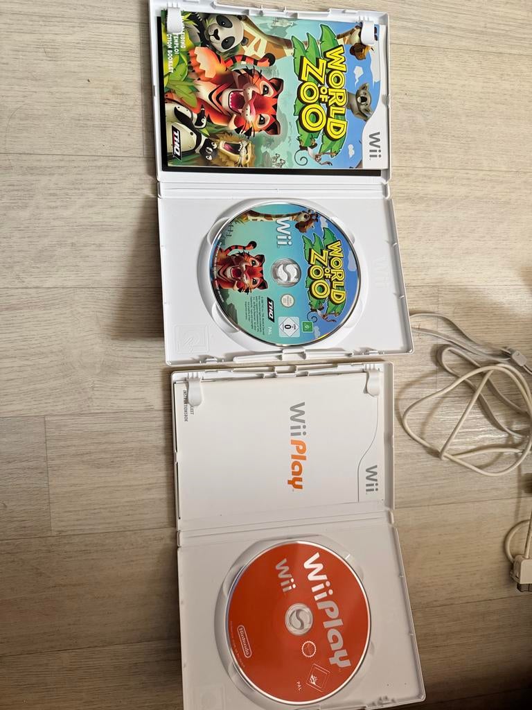Wii console met 4 games, Wii Fit Board en 2 controllers, Spelcomputers en Games, Spelcomputers | Nintendo Wii, Ophalen, Gebruikt
