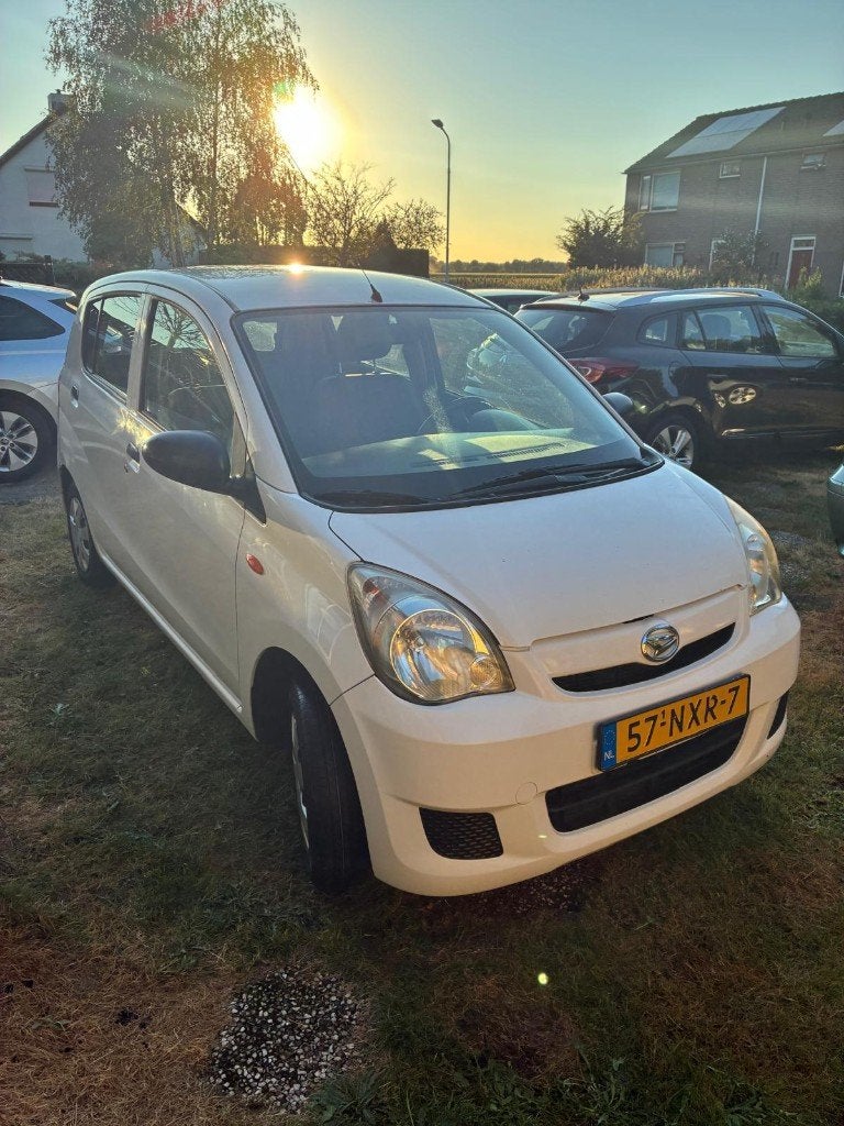 Daihatsu Cuore 1.0 5D 2010 - 178000 km - APK 12/2026, Auto's, Daihatsu, Voorwielaandrijving, Stof, 600 kg, Zwart