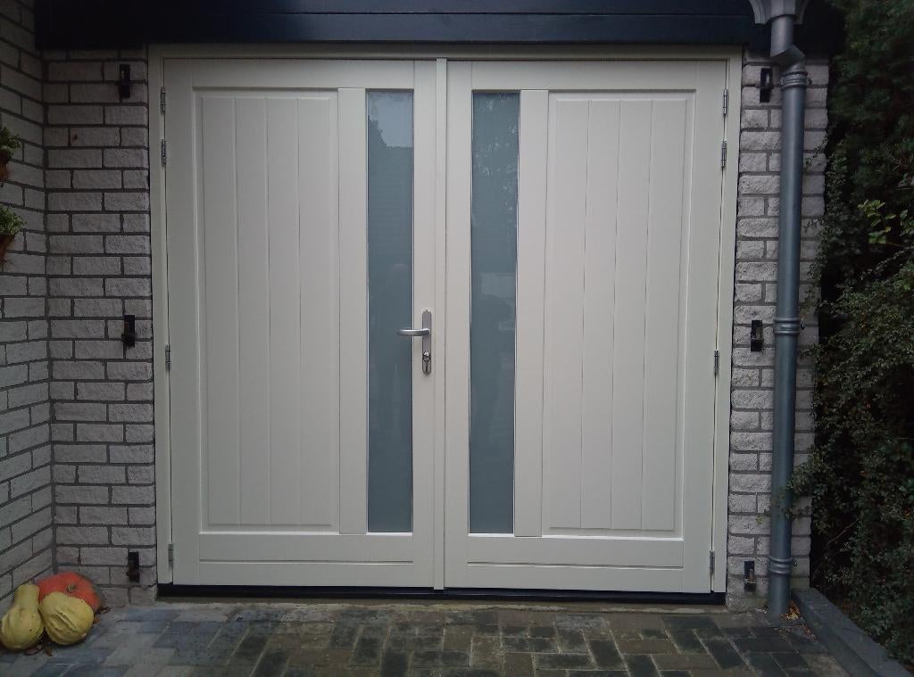 Geisoleerde garagedeuren, garagedeuren op maat ., Verzenden, Hout, 120 cm of meer, 215 cm of meer