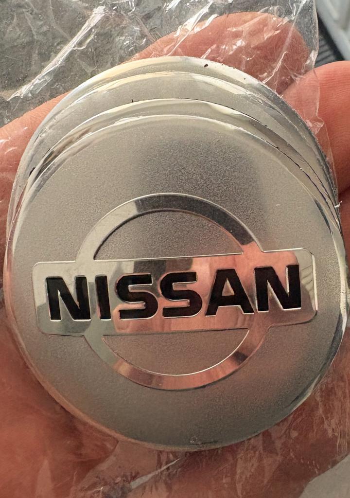 Naafdoppen naafstickers Nissan, Auto diversen, Ophalen of Verzenden, Zo goed als nieuw