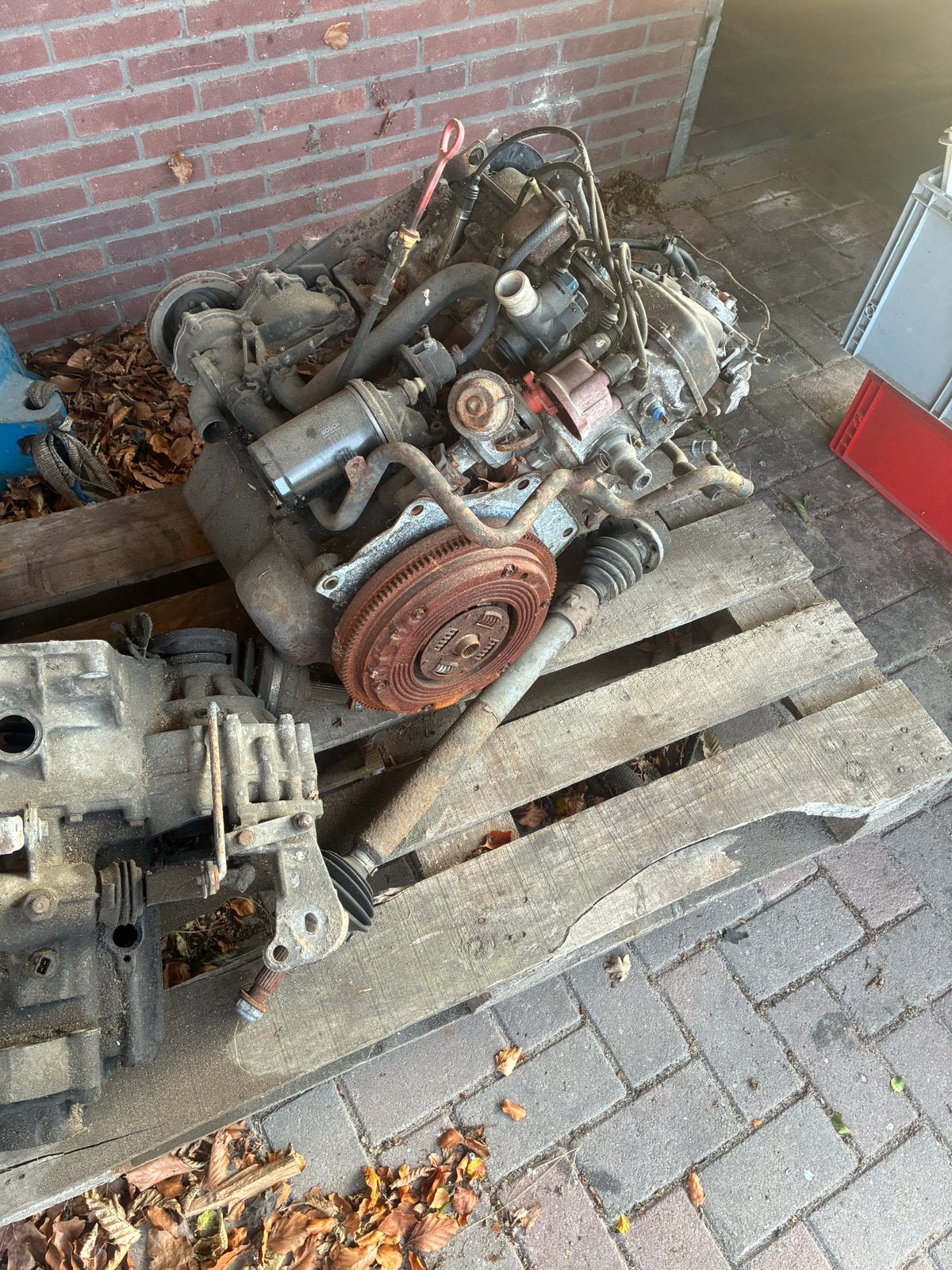 Motor en versnellingsbak van een Golf 2 CL, Ophalen