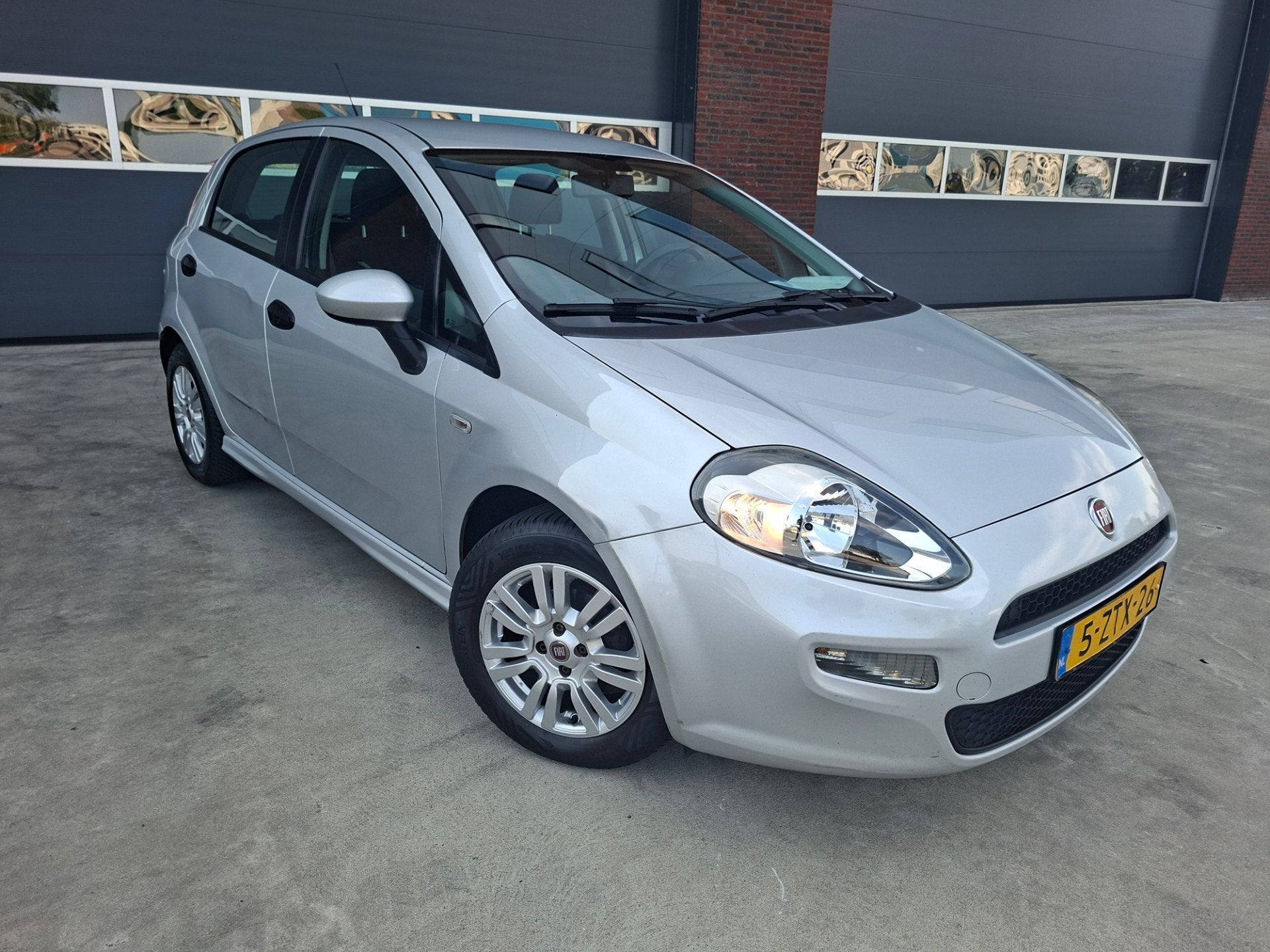 Fiat Punto Evo 1.3 M-Jet Street 5 deurs Airco/LMV APK 6-2027, Voorwielaandrijving, Euro 5, Stof, Gebruikt