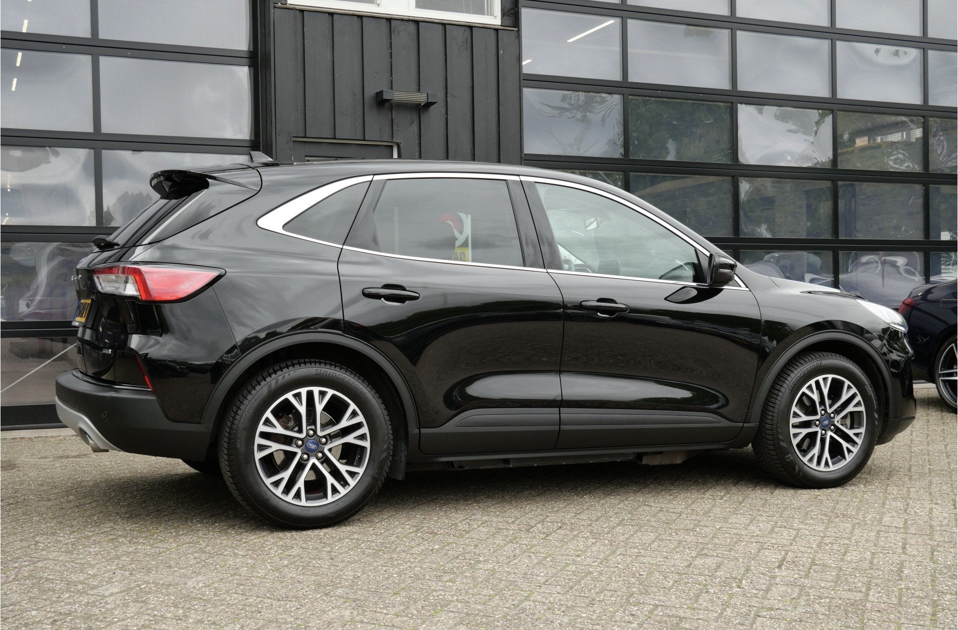 Ford Kuga 2.5 PHEV Titanium | Keyless | Carplay | 18'' | Sto, Auto's, Stof, Gebruikt, 4 cilinders, Zwart
