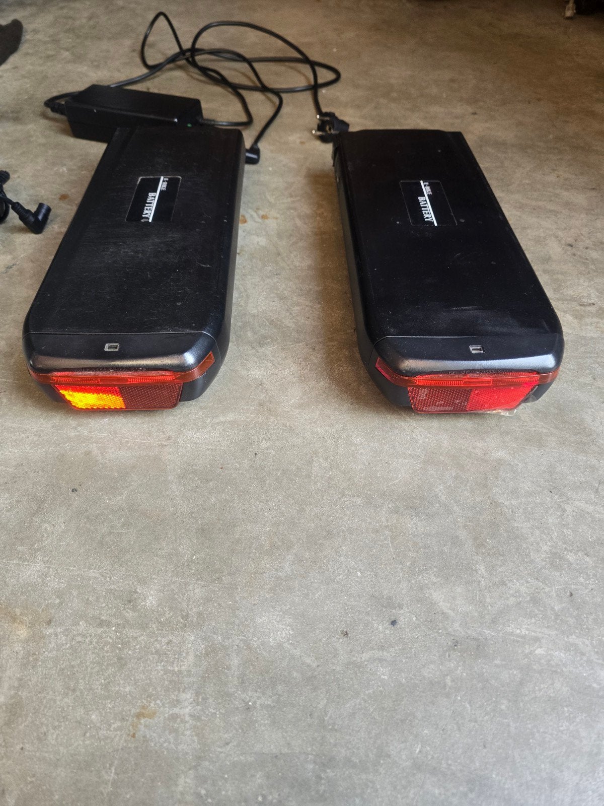 2x E-bike accu's met opladers, Gebruikt