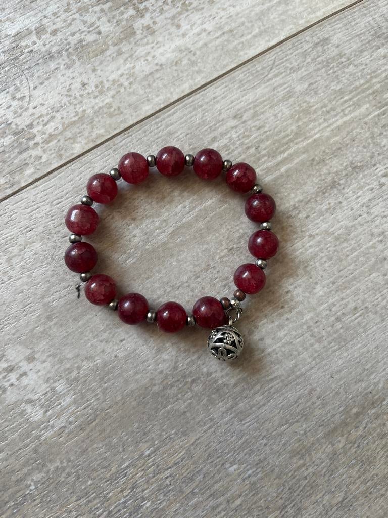 Armband met rode kralen en zilveren bedel uit Colombia, Overige materialen, Gebruikt, Ophalen of Verzenden, Met bedels of kralen