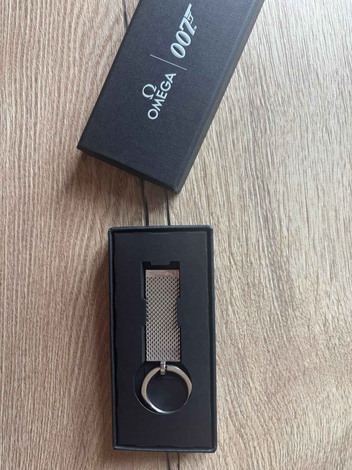 Omega 007 James Bond Sleutelhanger - Nieuw in doos, Verzamelen, Ophalen of Verzenden, Nieuw, Merk