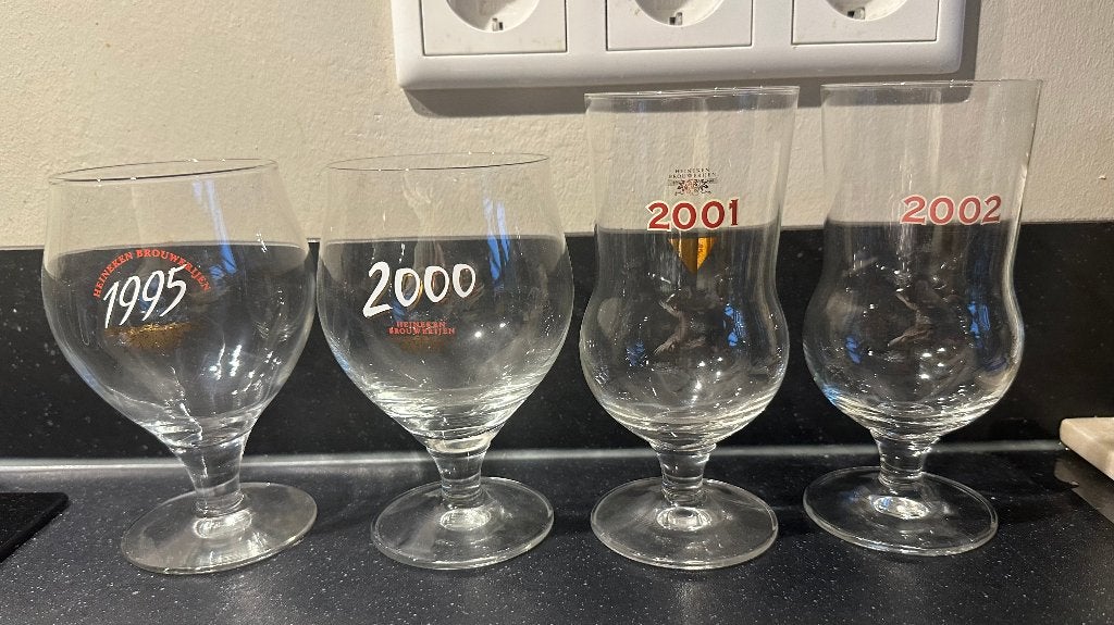 Vier jaartalglazen Heineken, Ophalen of Verzenden, Gebruikt, Glas of Glazen, Heineken