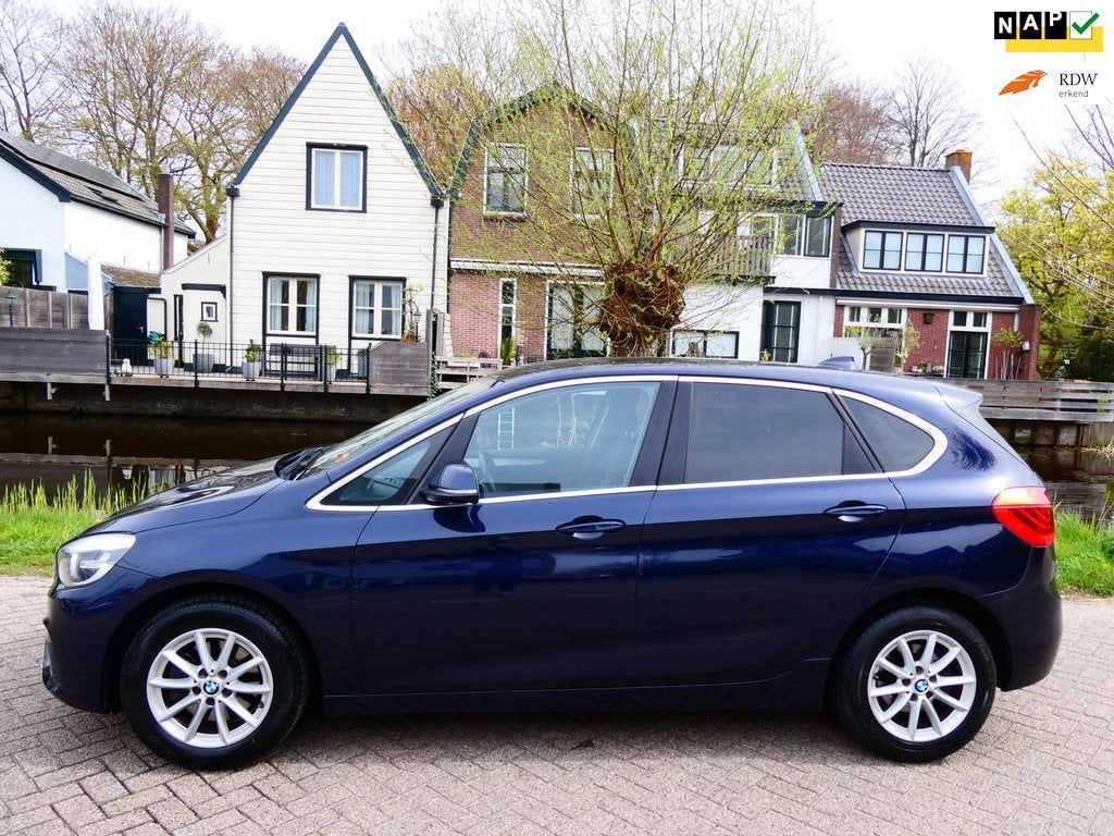 BMW 2-serie Active Tourer 220i Exe Automaat 192pk Clima Crui, Auto's, BMW, 1998 cc, Gebruikt, Euro 6, Blauw