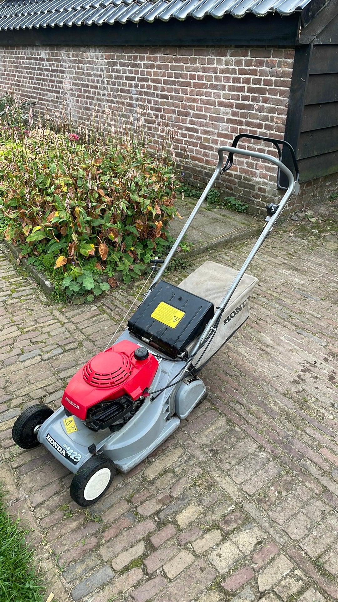 Honda hrb 423 met rol, Tuin en Terras, Ophalen, Benzine-grasmaaier, Opvangzak