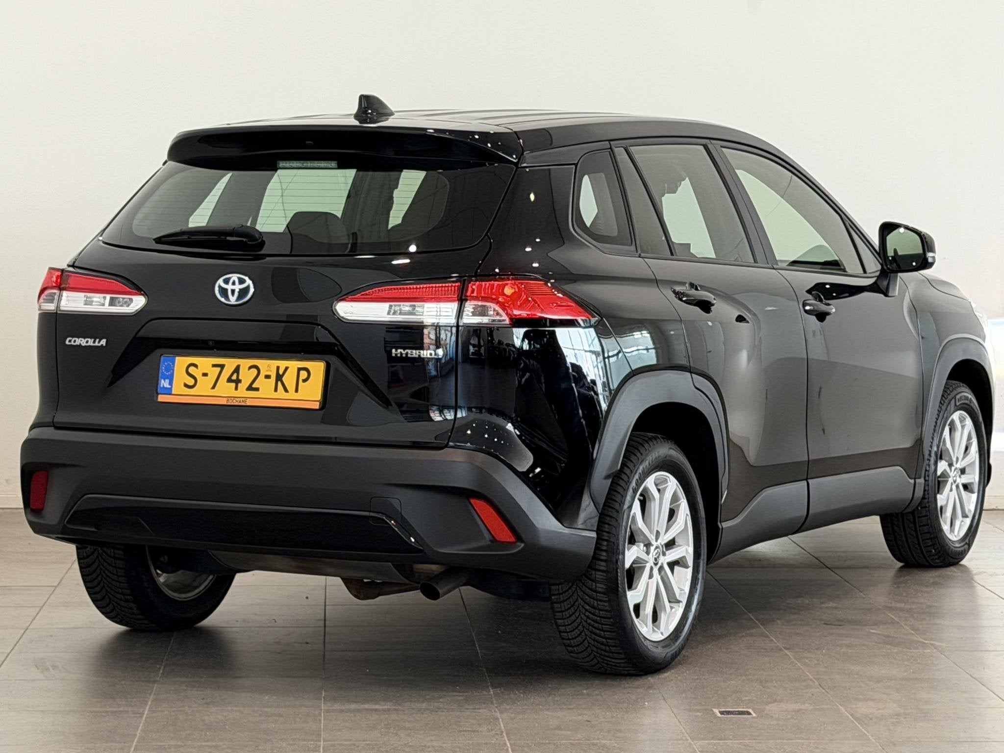 Toyota Corolla Cross 2.0 High Power Hybrid Active | LED | Ke, Stof, Gebruikt, 4 cilinders, Met garantie (alle)