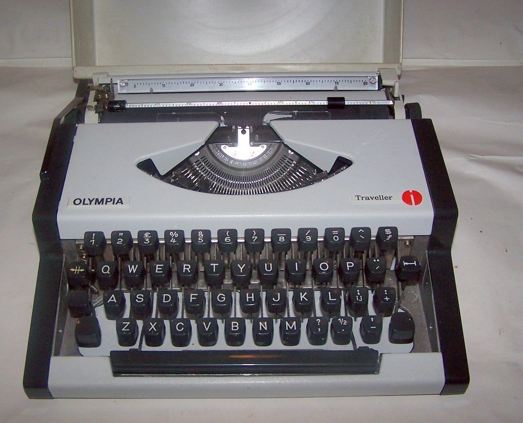 Olympia Traveller koffertypemachine. Izgs., Ophalen of Verzenden, Zo goed als nieuw