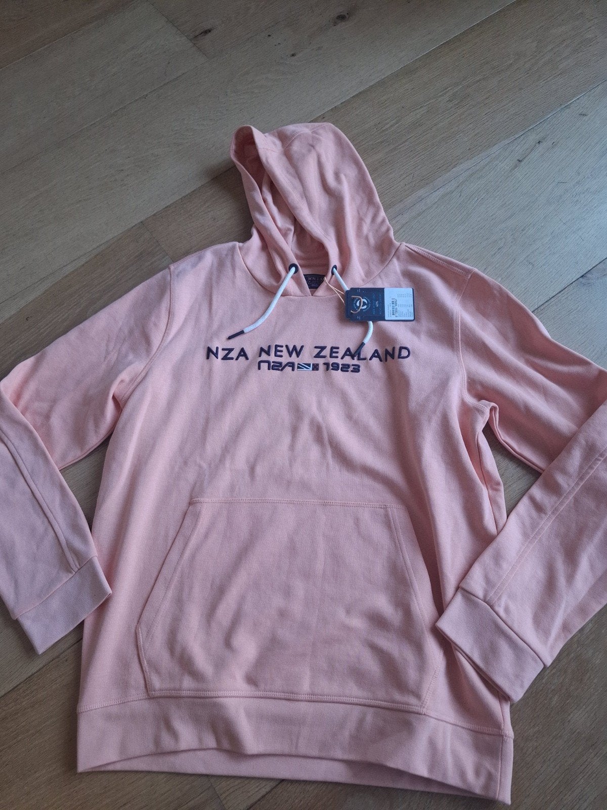 Nieuwe NZA New Zealand hoodie maat L - Apricot Orange, Maat 52/54 (L), NZA New Zealand, Nieuw, Oranje