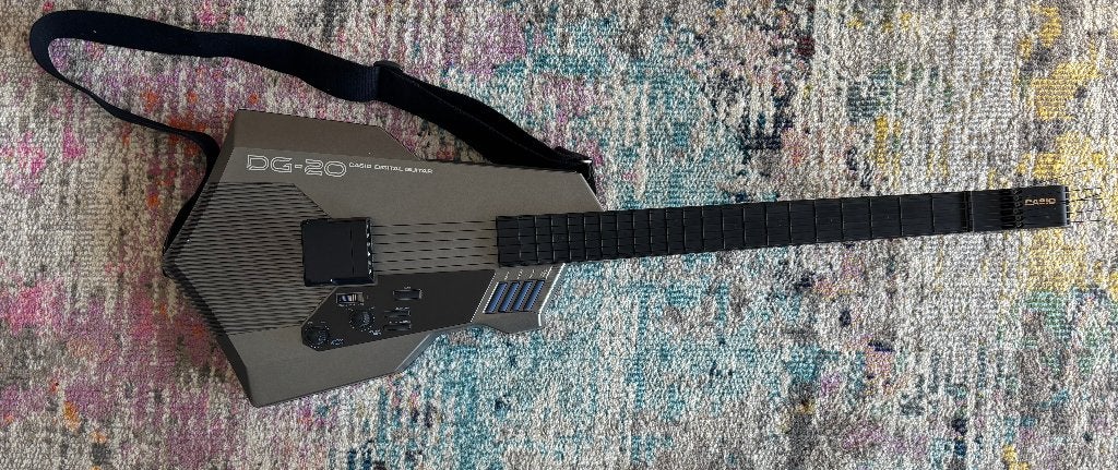 Casio DG-20 Digitale MIDI-gitaar (1987), Ophalen of Verzenden, Gebruikt, Solid body, Overige merken