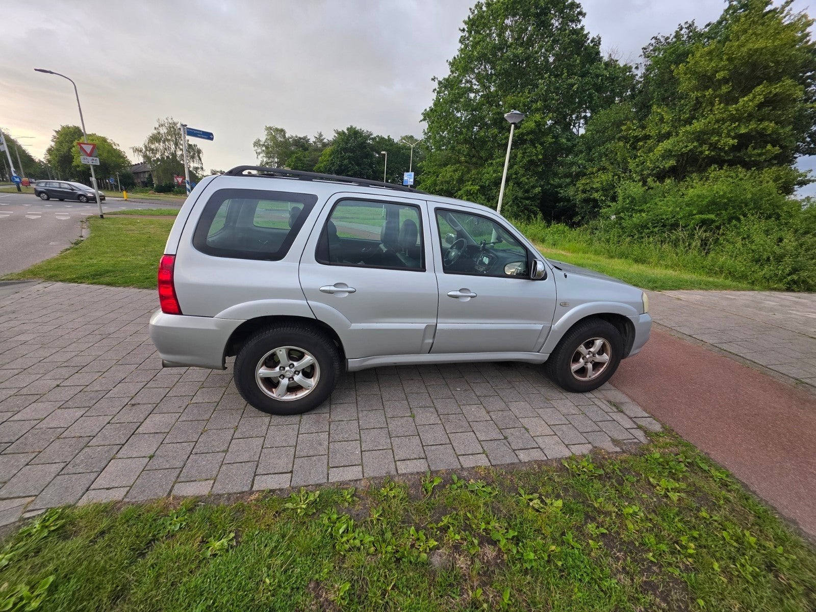 Mazda Tribute 3.0 V6 LPG Touring AUT 4WD 2005 Grijs, Auto's, Automaat, Bedrijf, 750 kg, Tribute