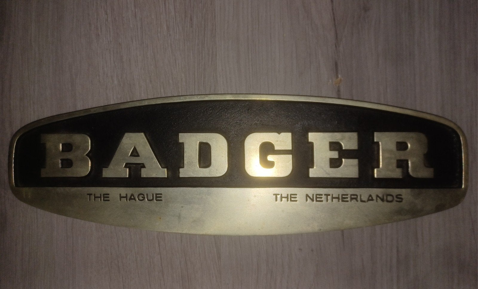 Vintage Badger metalen reclame plaat The Hague Netherlands, Ophalen of Verzenden, Reclamebord
