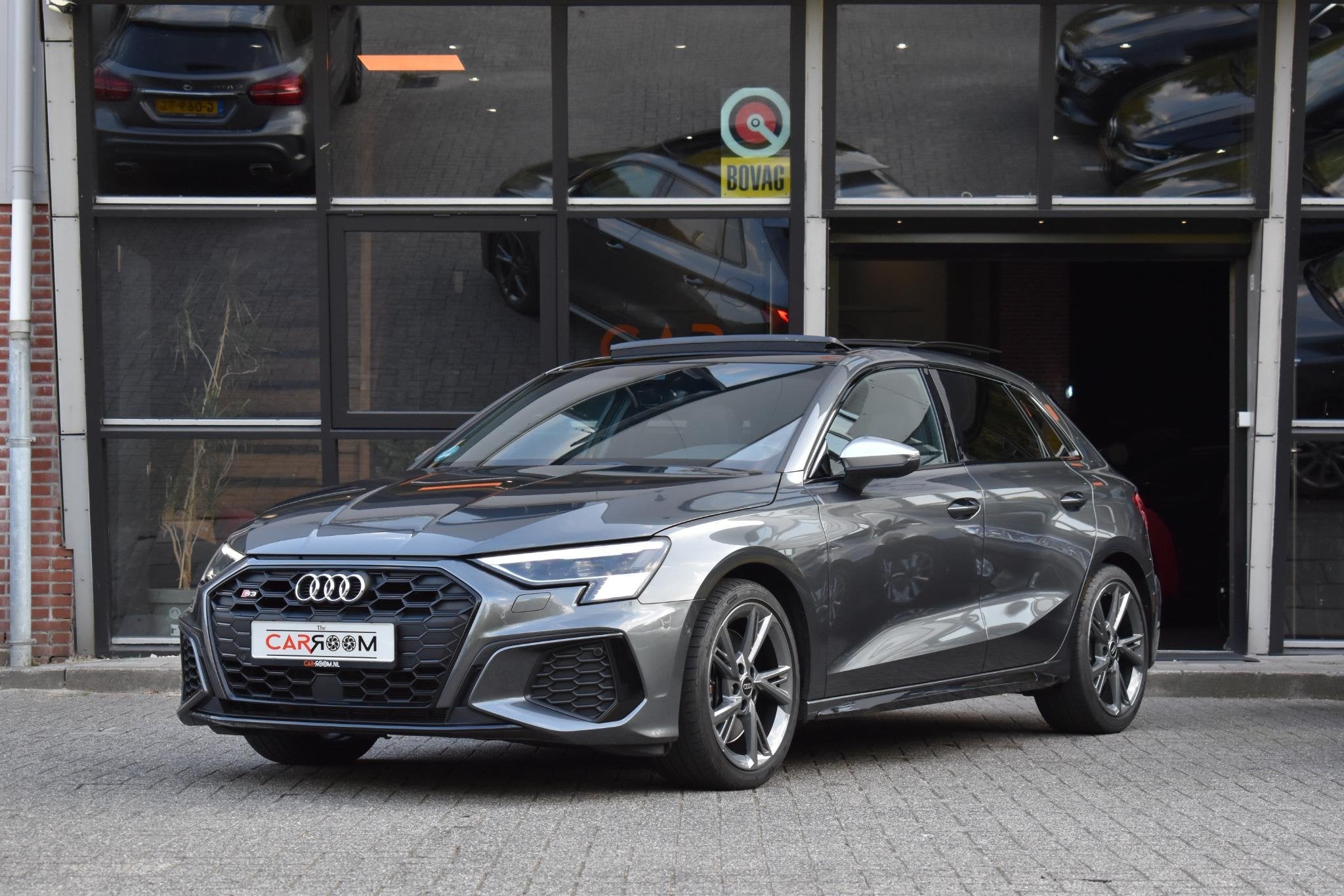Audi S3 Sportback 2.0 TFSI quattro Pano Massage Keyless Lane, Auto's, Gebruikt, 4 cilinders, Leder en Stof, Verwarmde buitenspiegels
