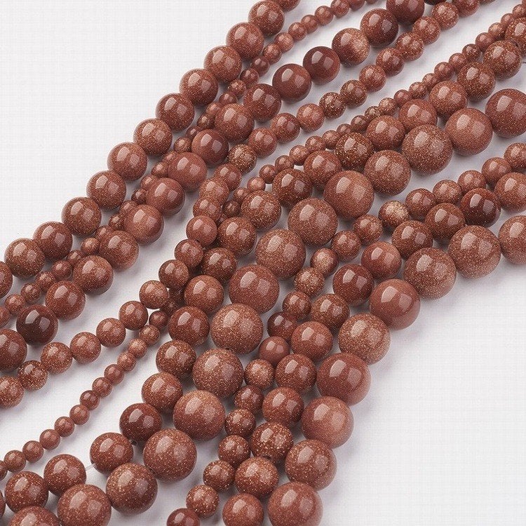 Vanaf € 3,25 Snoer Goldstone 4, 6, 8 en 10 mm., Kraal, SINO-SEAR GmbH, Feuerbachstrasse11, Potsdam, Germany, Nieuw