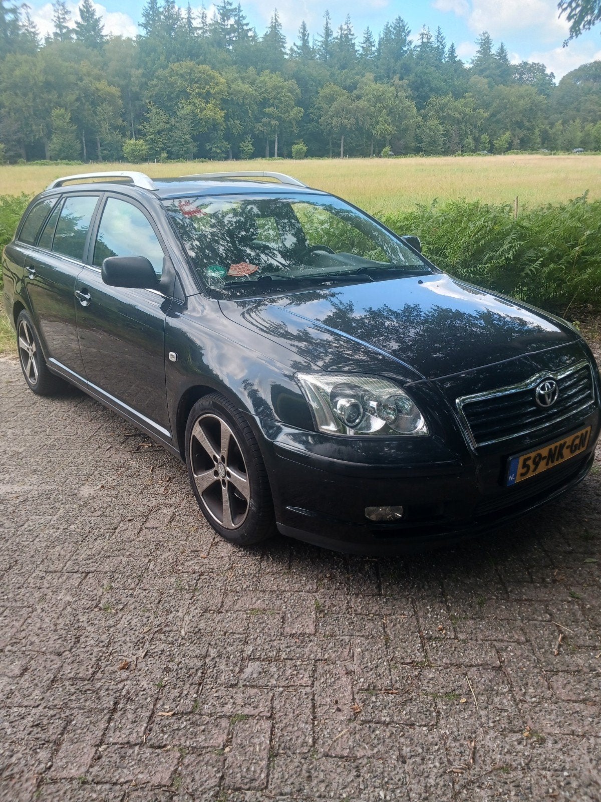 Toyota Avensis 2.4 16V AUTOMAAT WAGON 2003 NW.APK, Auto's, Toyota, Stof, Avensis, Zwart, Dealer onderhouden