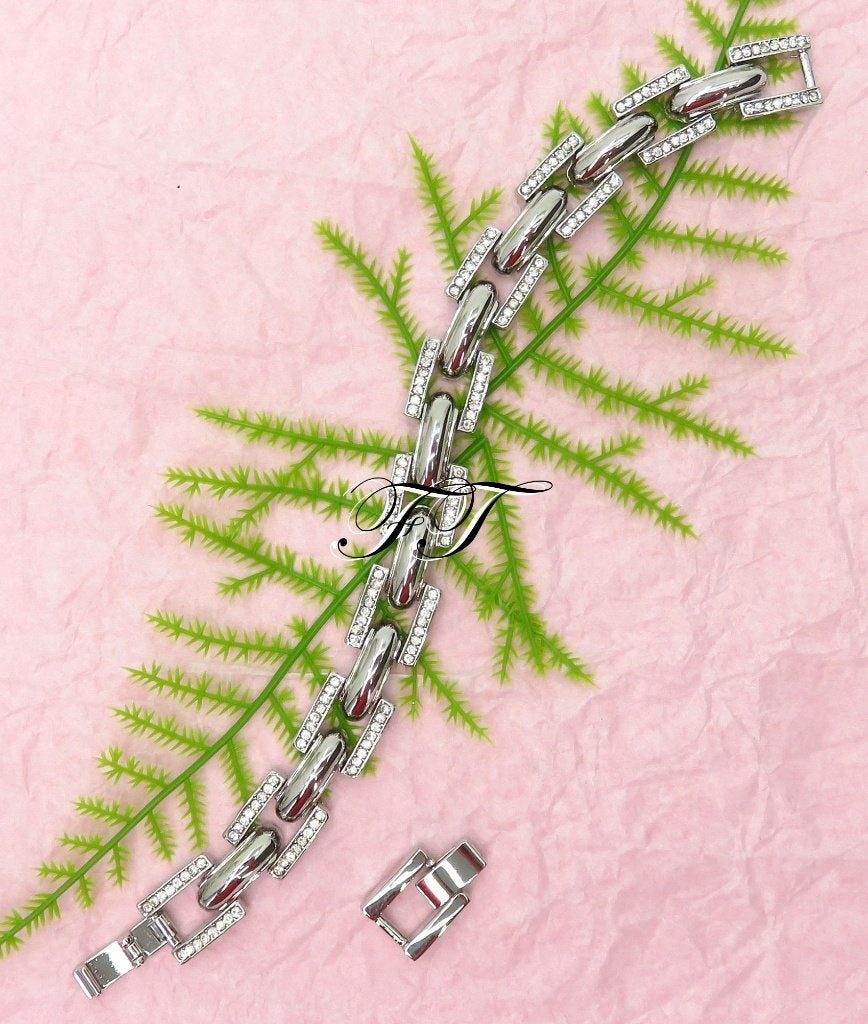 Prachtige zilver gekleurde schakelarmband met strass stenen., Sieraden, Tassen en Uiterlijk, Overige materialen, Nieuw, Ophalen of Verzenden