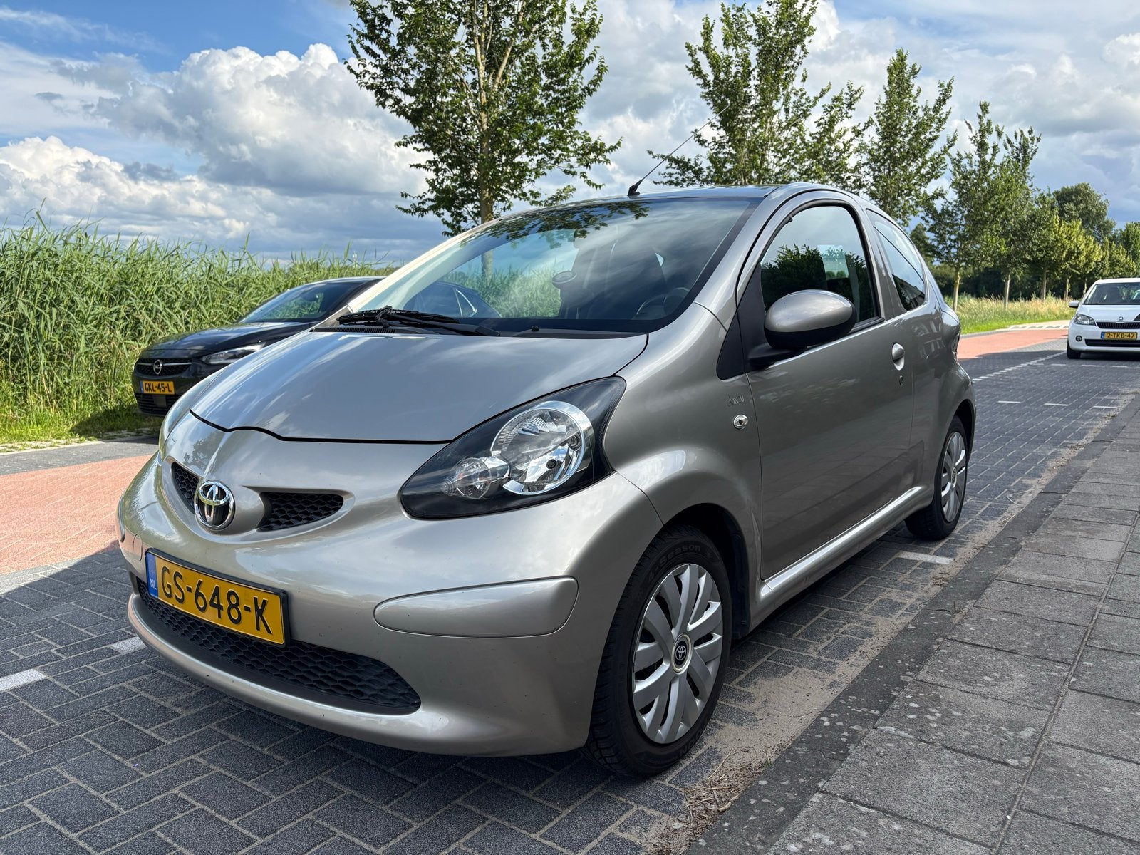 Toyota Aygo Calvin Klein | Airco | Nieuwe APK | All-Seasons, Auto's, Zwart, Bruin, 4 stoelen, 68 pk