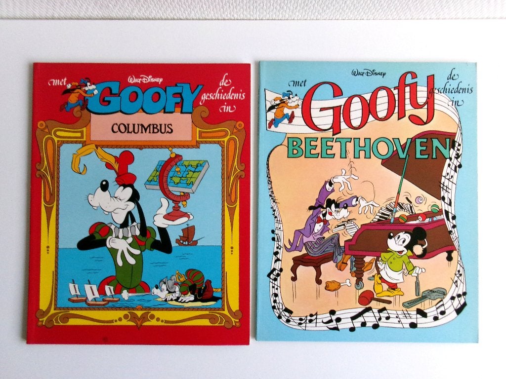 IS BETAALD  2 Stripboeken - Met Goofy De Geschiedenis In 2&3, Meerdere stripboeken, Ophalen of Verzenden, Gelezen, Walt Disney Studio's