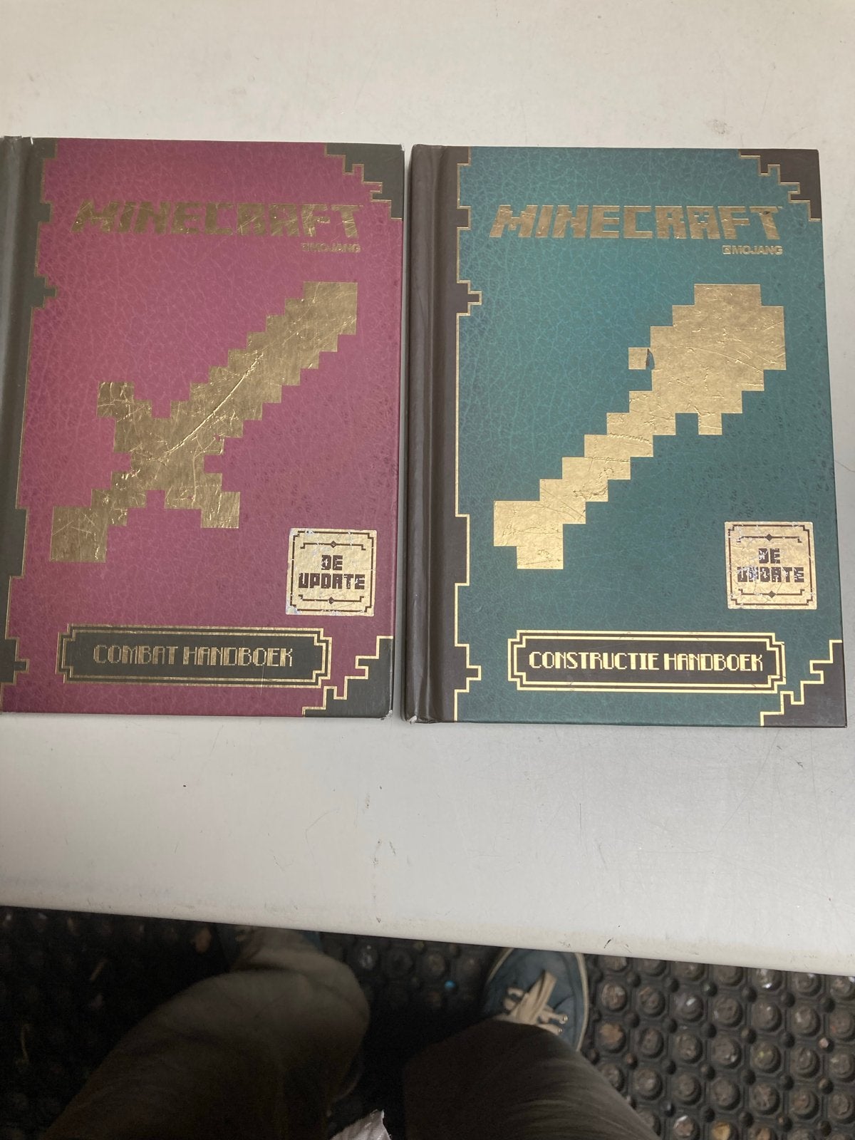 Minecraft Handboeken: Combat & Constructie (De Update), Ophalen of Verzenden, Gelezen