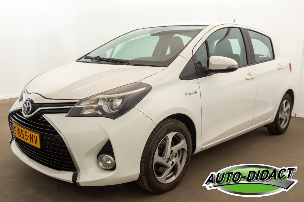 Toyota Yaris 1.5 Hybrid Automaat, Clima, NAP, APK 03-2027, Auto's, Euro 6, Bedrijf, Grijs, Hybride Elektrisch/Benzine