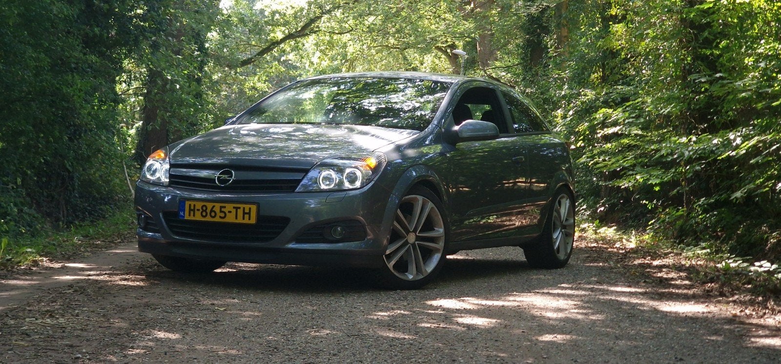 Opel Astra GTC 1.6 Sport, Auto's, Opel, Voorwielaandrijving, Stof, 1145 kg, Zwart