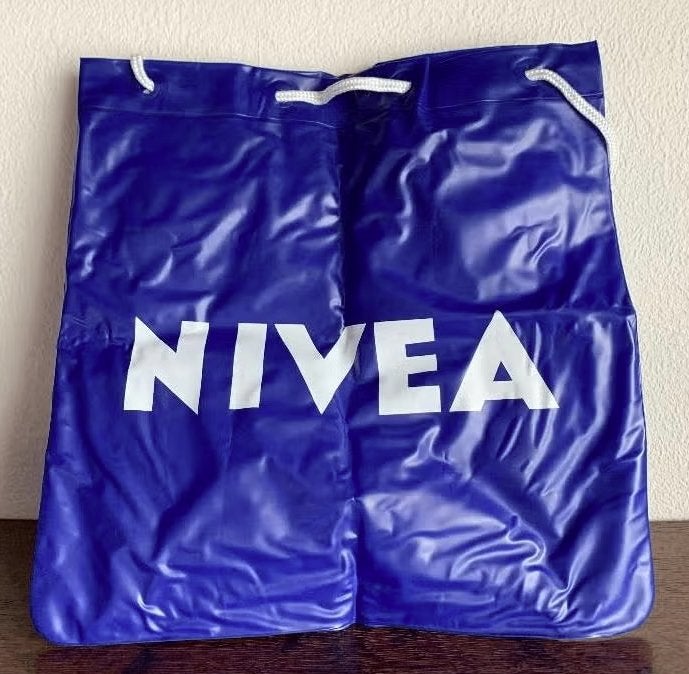Waterdicht strandtasje Nivea, kussen, badkussen, Ophalen of Verzenden, Nieuw