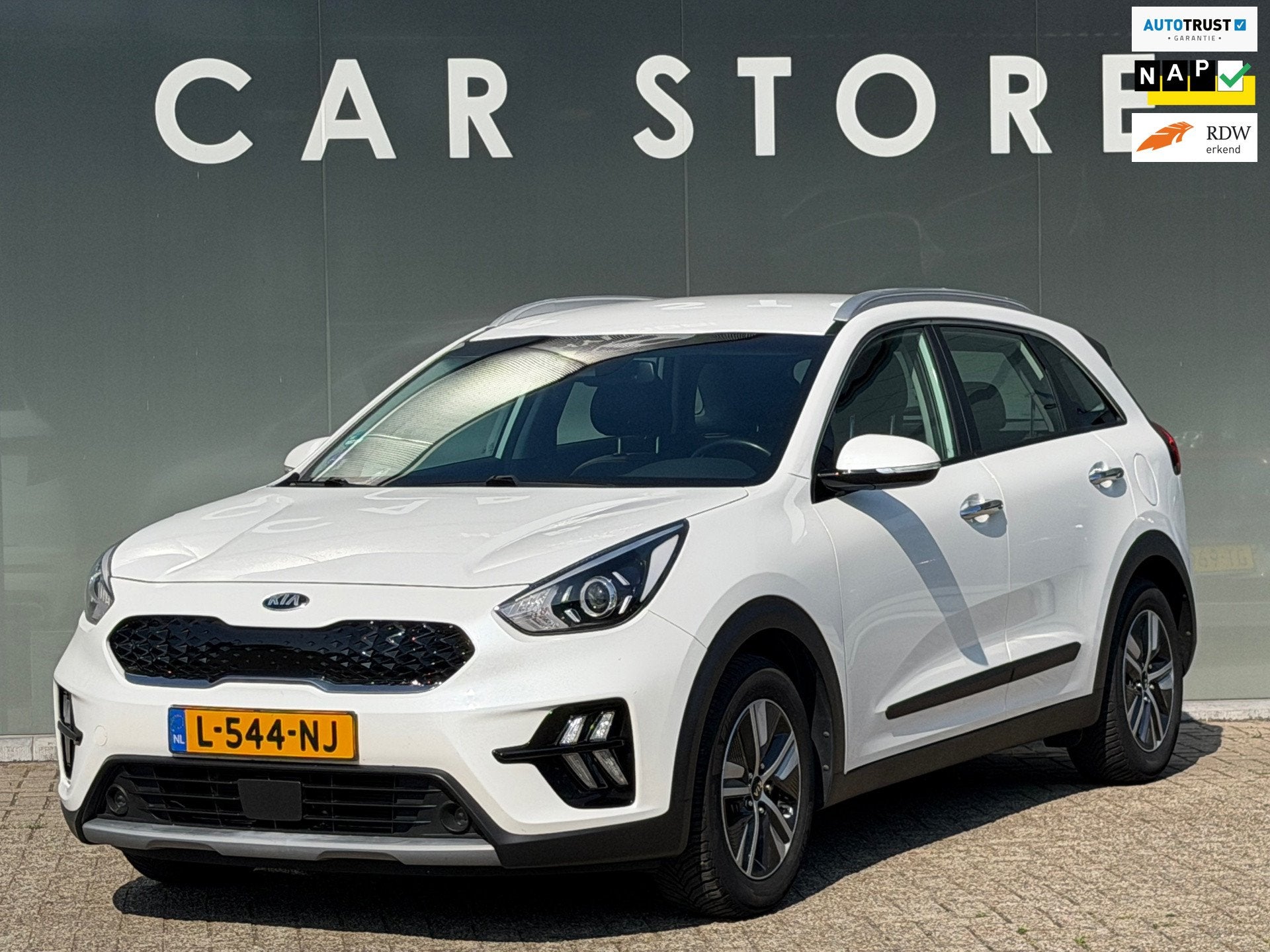 Kia Niro 1.6 GDi Hybrid DynamicLine Dealer onderhouden TREKH, Auto's, Kia, Gebruikt, Leder en Stof, Wit, Origineel Nederlands