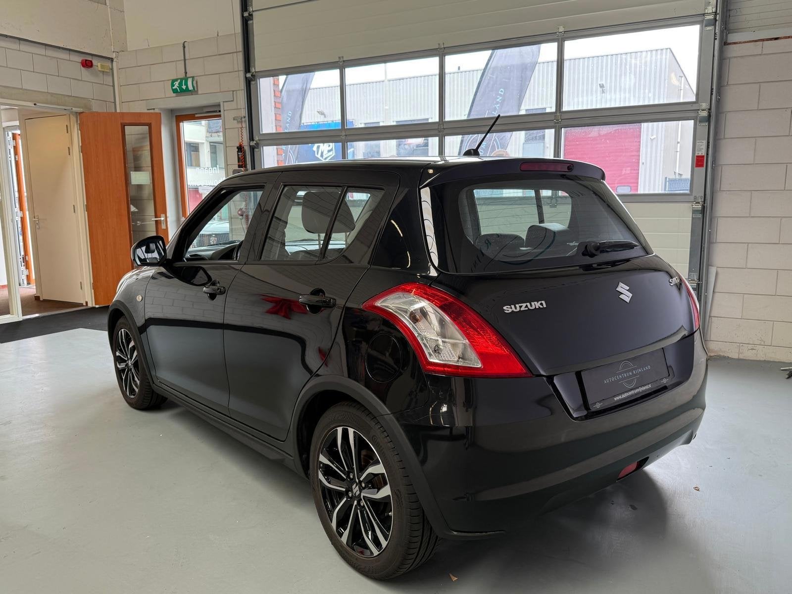 Suzuki Swift 1.2 Style EASSS Airco, Cruise control, Euro 5, Gebruikt, 4 cilinders, 400 kg