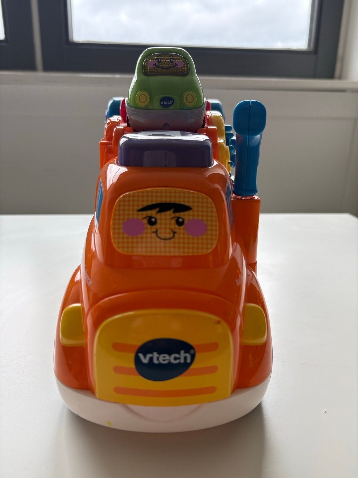 VTech Toet Toet Auto's Ambulance met kleine auto, Kinderen en Baby's, Speelgoed | Vtech, Ophalen of Verzenden, Gebruikt, 6 maanden tot 2 jaar