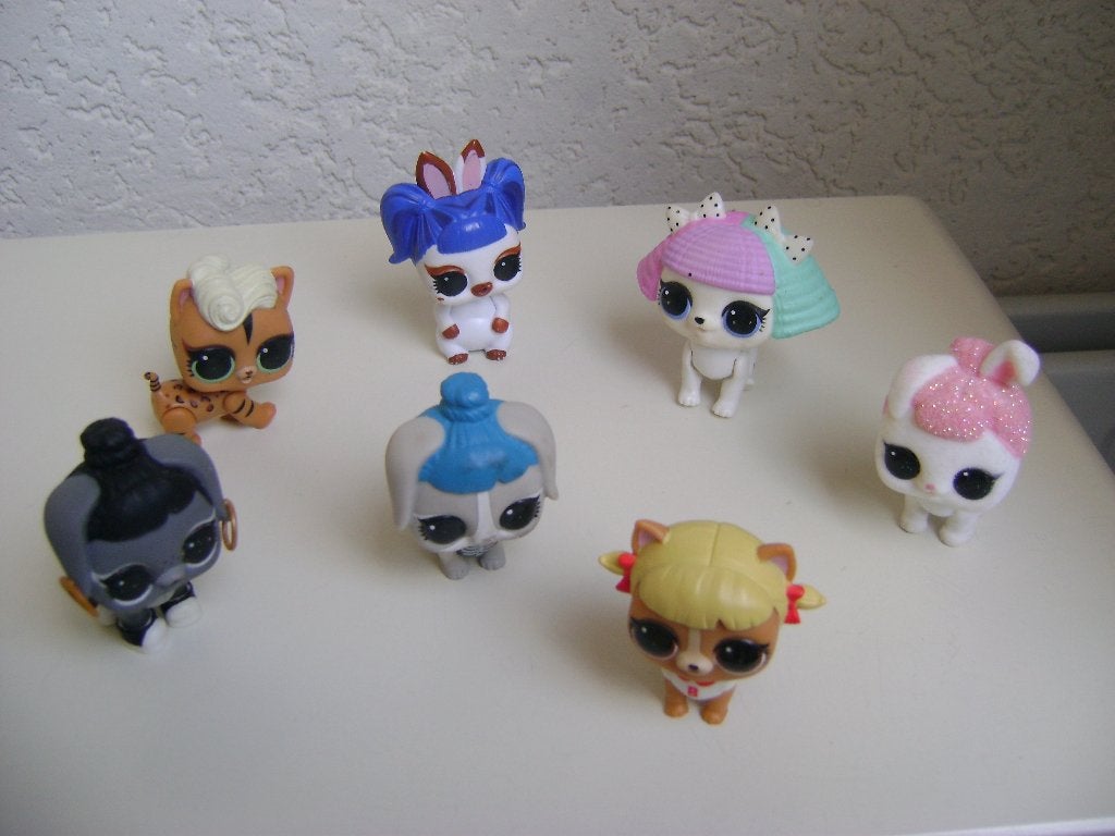7 petshop hondjes met strikjes en botjes als oorbellen, Ophalen of Verzenden, Zo goed als nieuw