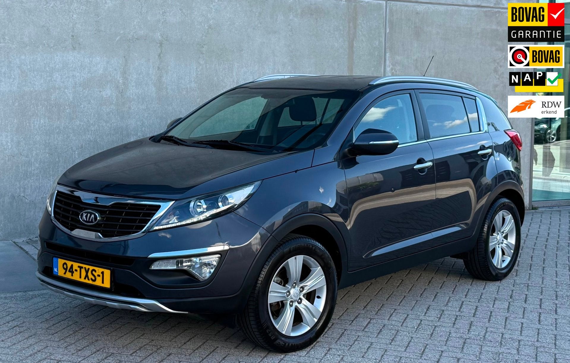 Kia Sportage 1.6 GDI X-ecutive Plus Pack Grijs 2012 NAP|APK, Auto's, Kia, Voorwielaandrijving, Euro 5, 135 pk, Leder en Stof