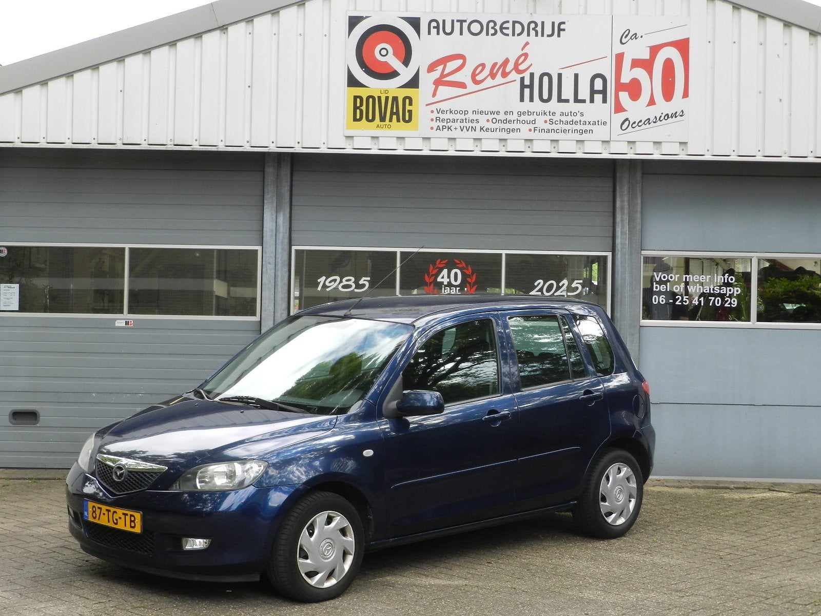 Mazda 2 1.4 Exclusive 5Deurs Metallic lak Airco Electrische, Auto's, Voorwielaandrijving, Dealer onderhouden, Zwart, 4 cilinders