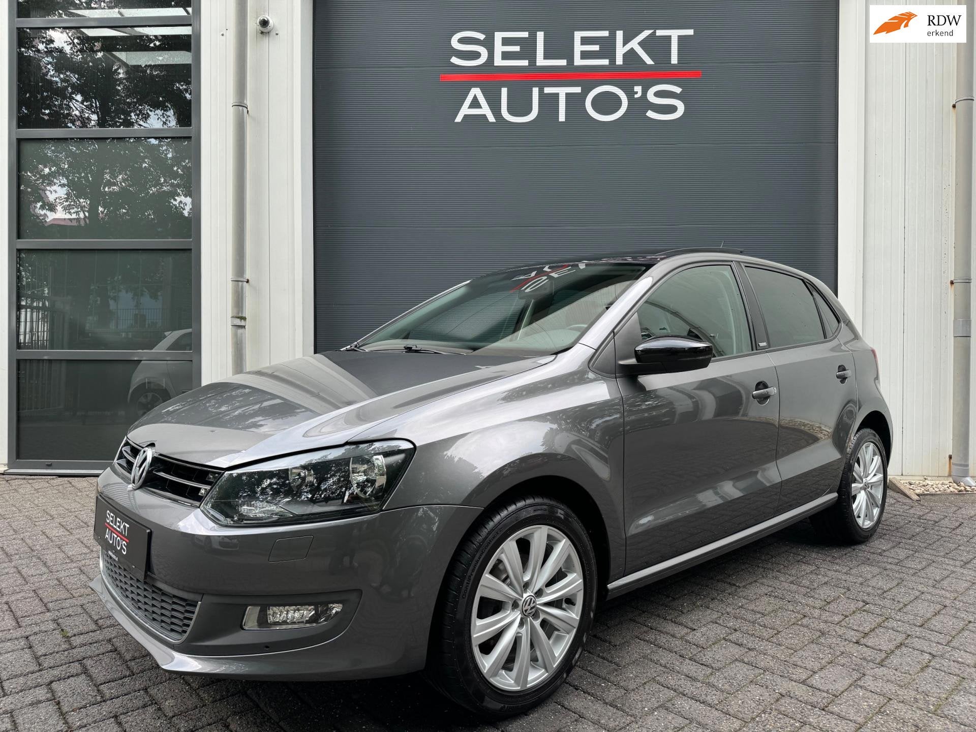 Volkswagen Polo 1.4-16V Style Panoramadak/Airco/Cruise/Navig, Voorwielaandrijving, Dealer onderhouden, 86 pk, Gebruikt