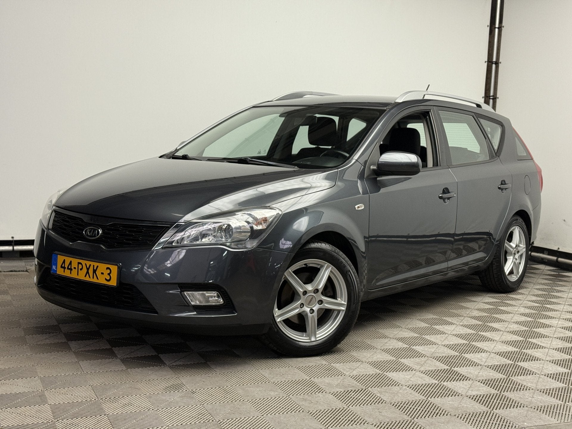 Kia cee'd 1.4 CVVT X-ecutive Navi ECC Trekhaak NL Auto, Auto's, Voorwielaandrijving, Euro 5, Stof, Gebruikt